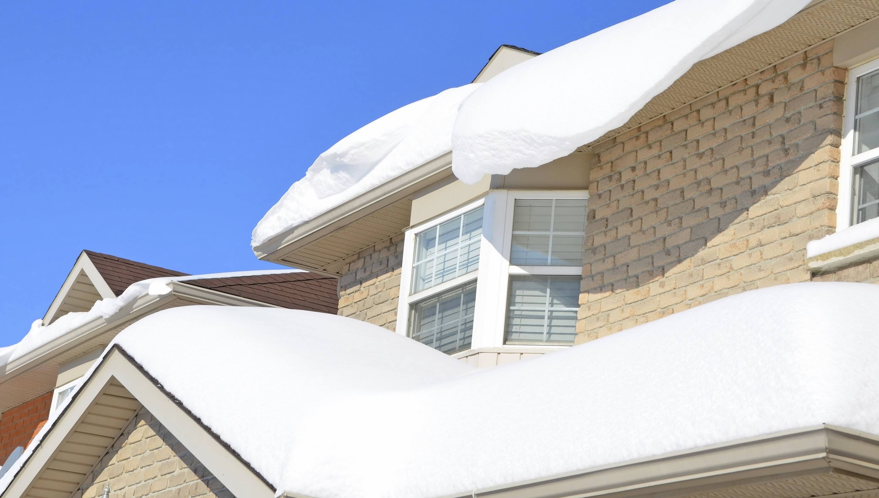 heavy snow on new england roof